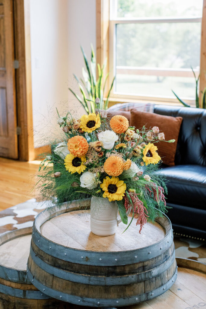 Honey Reign is bursting with orange dahlias, buttery sunflowers, and soft cream roses. It’s rebirth in bloom.